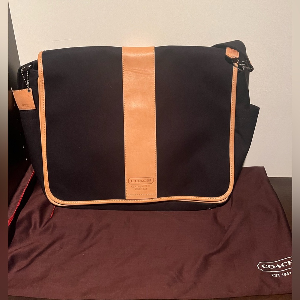Coach laptop bag never used. Perfect condition.